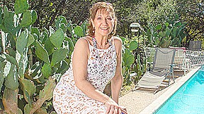 American granny playing with her pussy at the pool