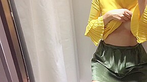 Masturbating in a fitting room